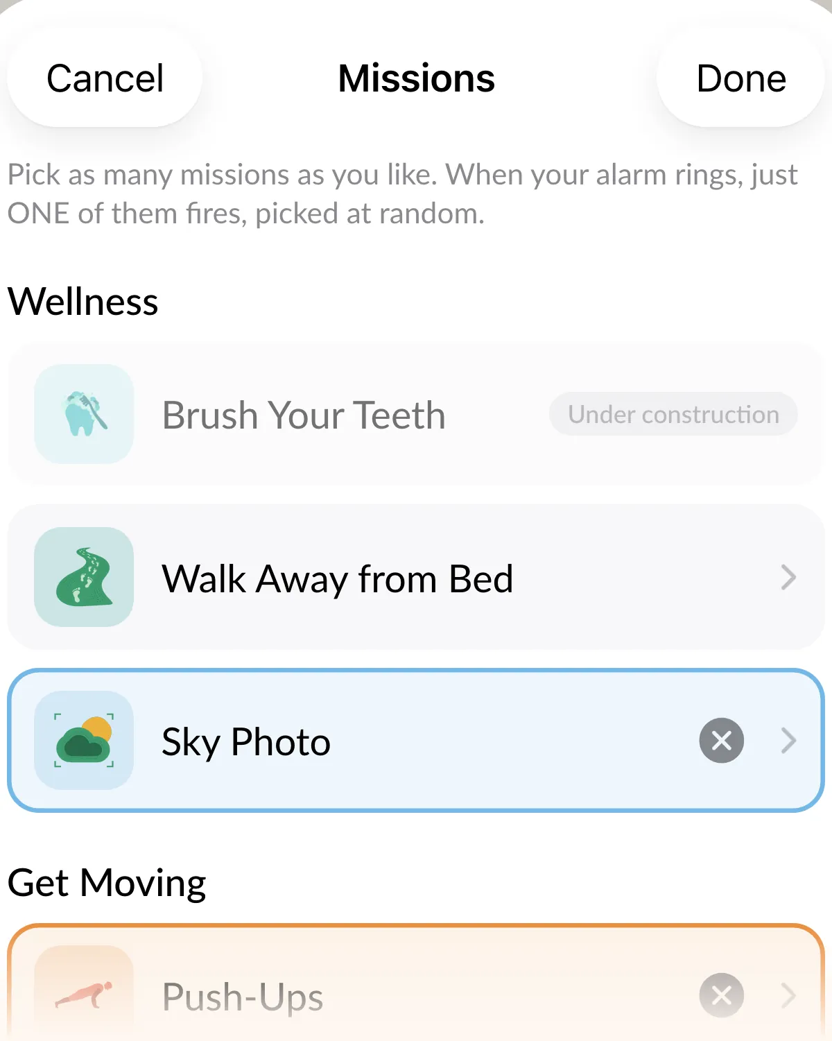 The Missions list: the Wellness group with Brush Your Teeth marked Under construction, Walk Away from Bed, and Sky Photo selected, then the Get Moving group starting with Push-Ups.
